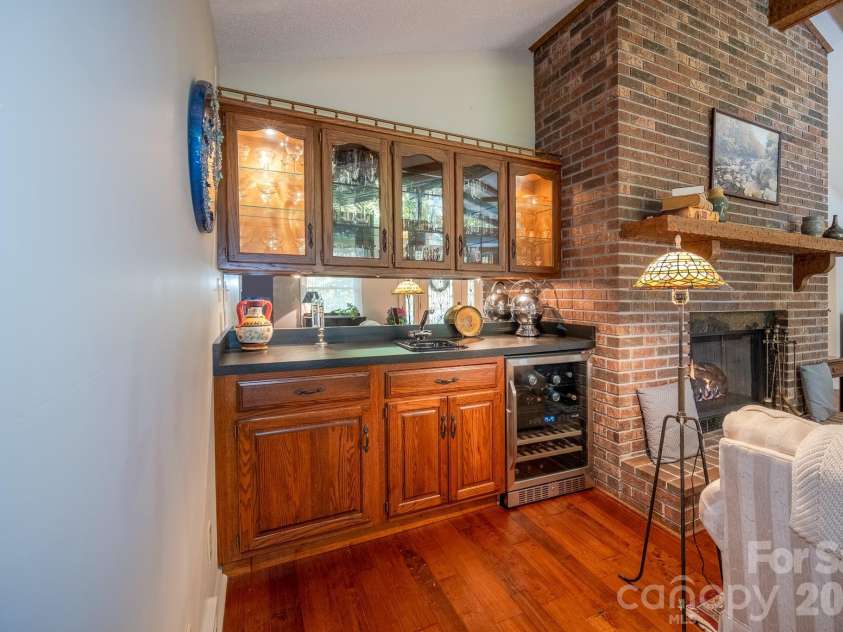 1955 Connestee Trail, Brevard, NC 28712.  MLS# CAR4313257, YatesRealty ID 17335. Functional wet bar and wine fridge