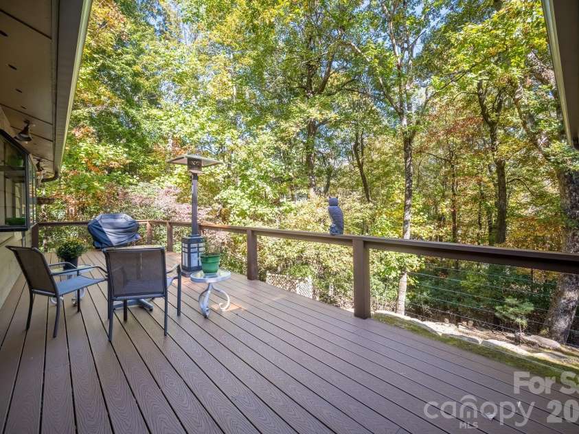 1955 Connestee Trail, Brevard, NC 28712.  MLS# CAR4313257, YatesRealty ID 17335. Rear deck perfect for outdoor fun