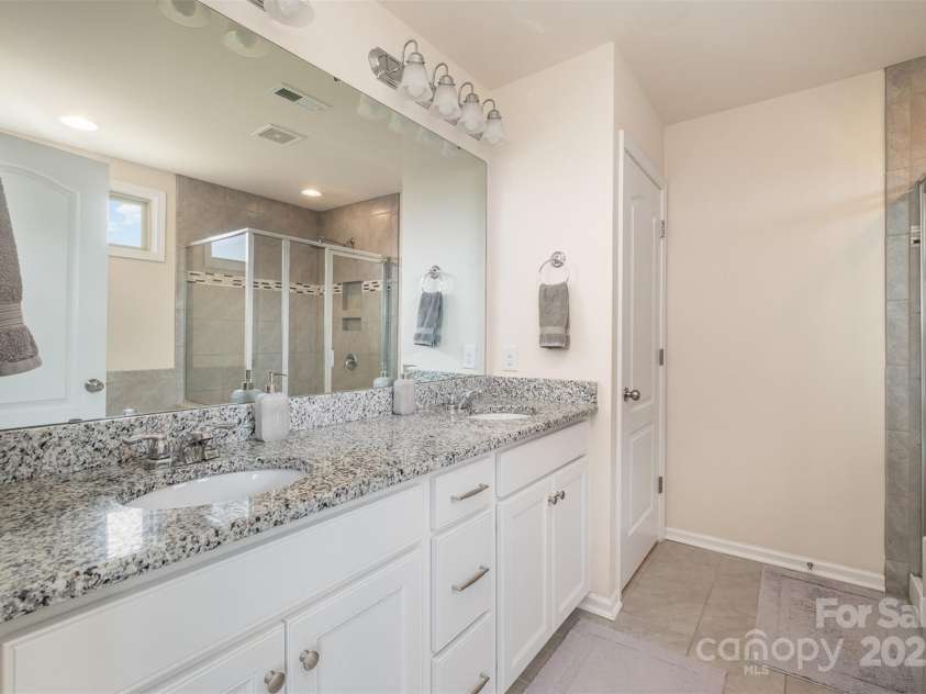 2014 Drawbridge Drive, Fort Mill, SC 29707.  MLS# CAR4257570, YatesRealty ID 17339. Primary bathroom