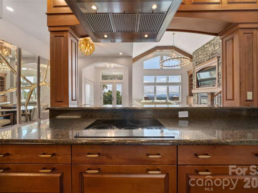 4 Chimney Crest Drive, Asheville, NC 28806.  MLS# CAR4421093, YatesRealty ID 17341. Creating culinary masterpieces with an inspiring view