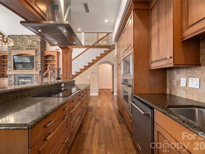 4 Chimney Crest Drive, Asheville, NC 28806.  MLS# CAR4421093, YatesRealty ID 17341. Custom cabinetry with huge pantry pull outs