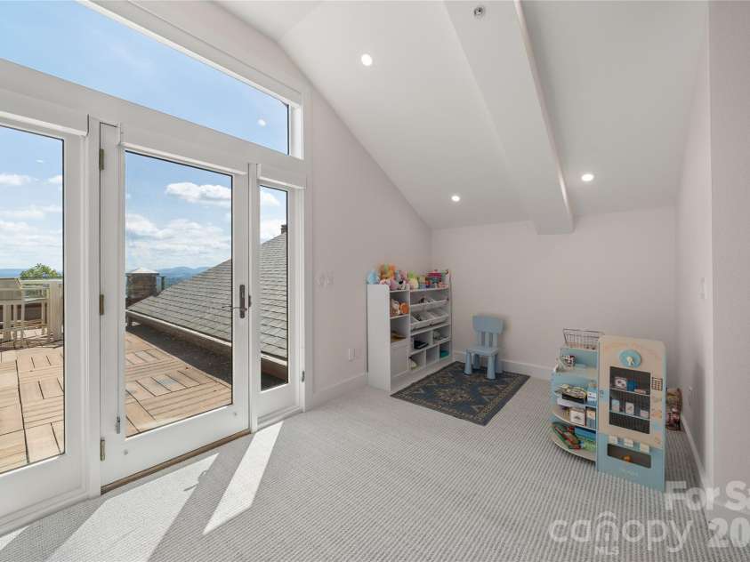 4 Chimney Crest Drive, Asheville, NC 28806.  MLS# CAR4421093, YatesRealty ID 17341. Upper bedroom 3 with access to rooftop terrace