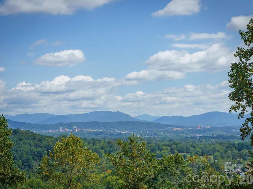 4 Chimney Crest Drive, Asheville, NC 28806.  MLS# CAR4421093, YatesRealty ID 17341. Views forever!