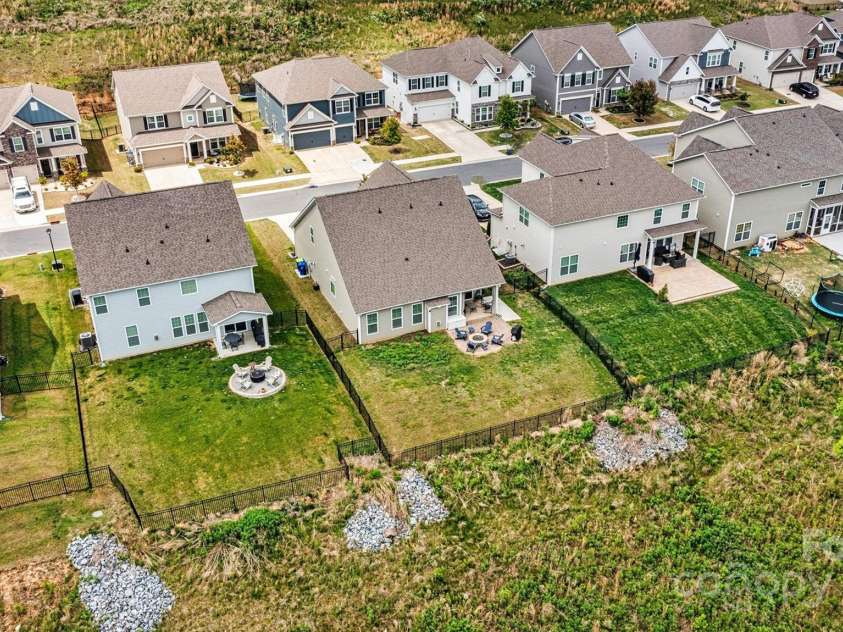 3193 Burnello Court, Iron Station, NC 28080.  MLS# CAR4234099, YatesRealty ID 17342. A more private yard with woods behind