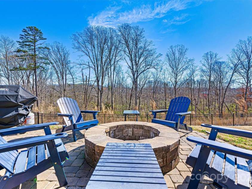 3193 Burnello Court, Iron Station, NC 28080.  MLS# CAR4234099, YatesRealty ID 17342. Fire pit