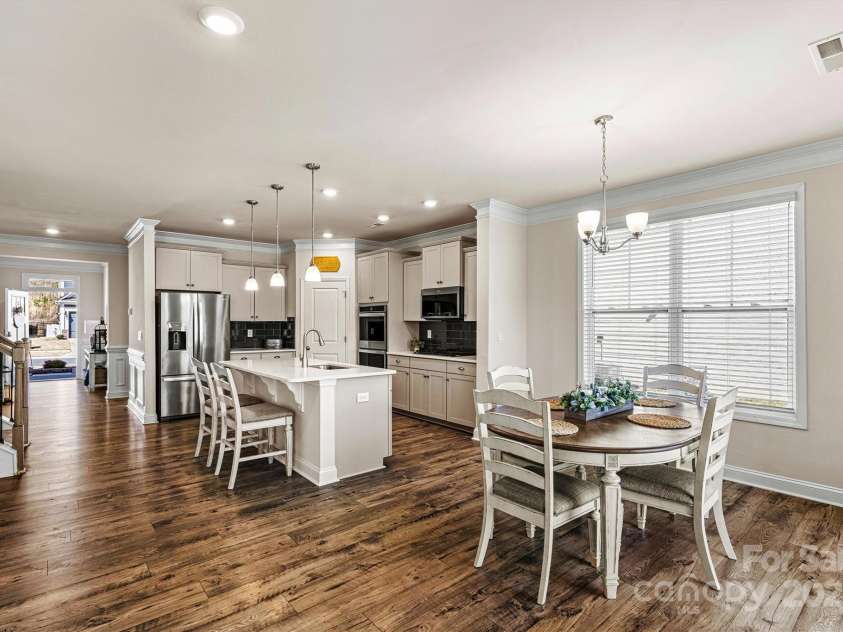 3193 Burnello Court, Iron Station, NC 28080.  MLS# CAR4234099, YatesRealty ID 17342. Open floor plan dining