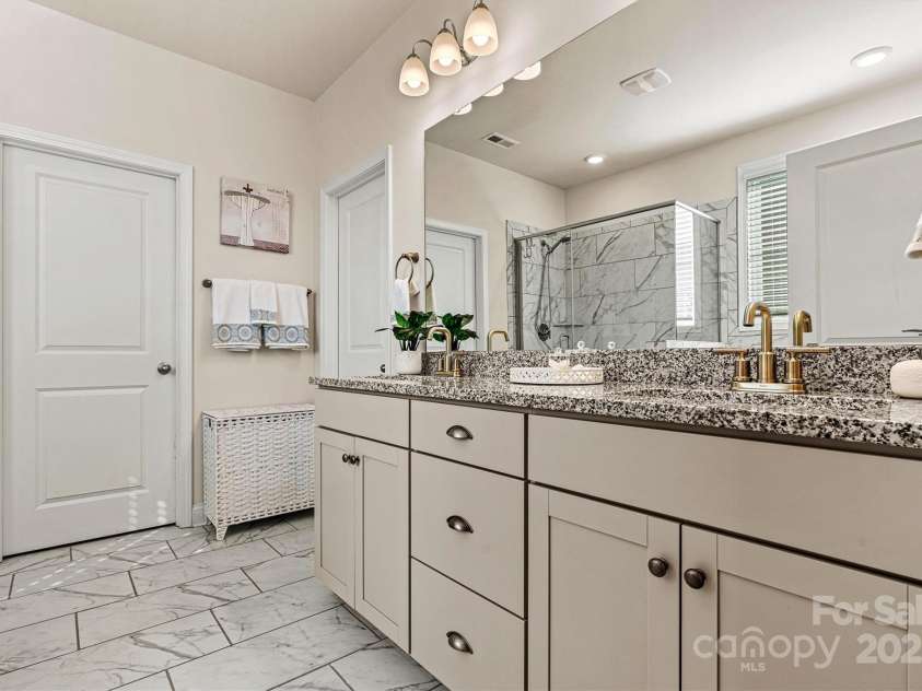 3193 Burnello Court, Iron Station, NC 28080.  MLS# CAR4234099, YatesRealty ID 17342. Primary bath with dual sinks