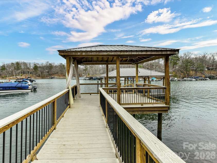 1805 Mt Isle Harbor Drive, Charlotte, NC 28214.  MLS# CAR4353230, YatesRealty ID 17344. Gorgeous covered dock