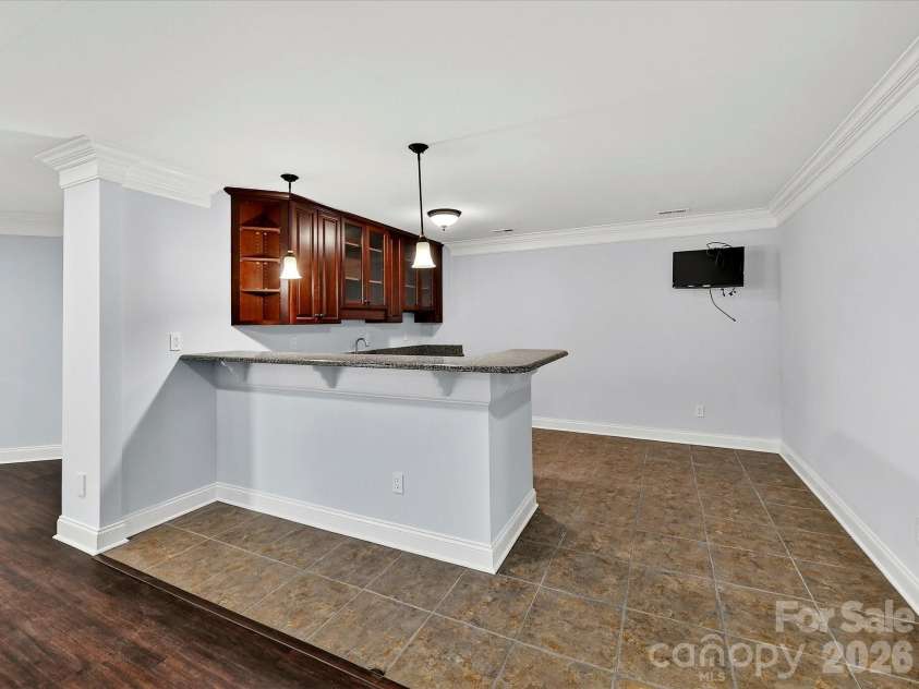 1805 Mt Isle Harbor Drive, Charlotte, NC 28214.  MLS# CAR4353230, YatesRealty ID 17344. Kitchenette in basement