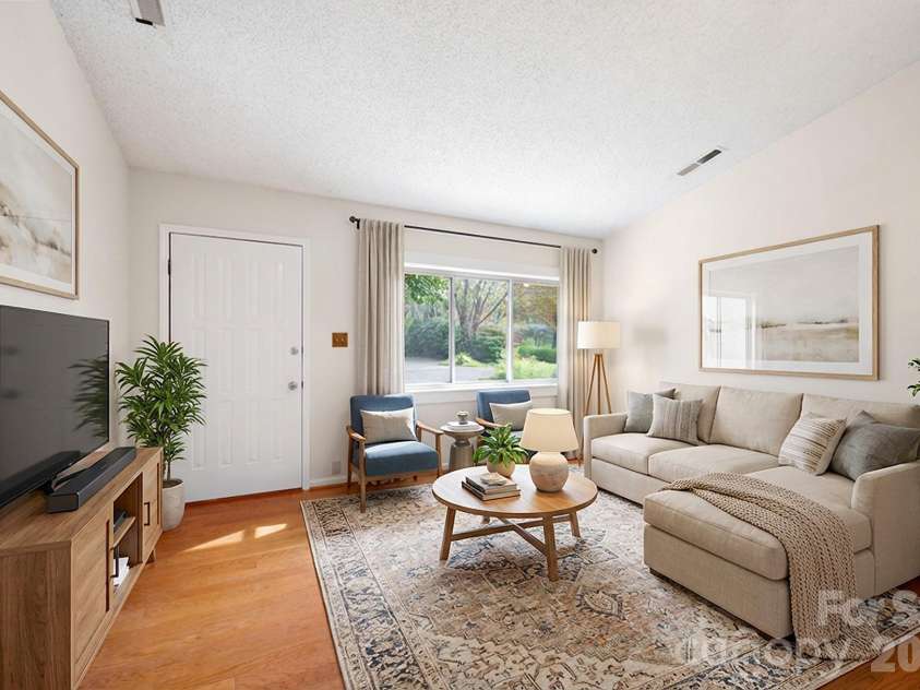 24 Green Acres Drive, Candler, NC 28715.  MLS# CAR4318408, YatesRealty ID 17347. Virtually Staged Living Room