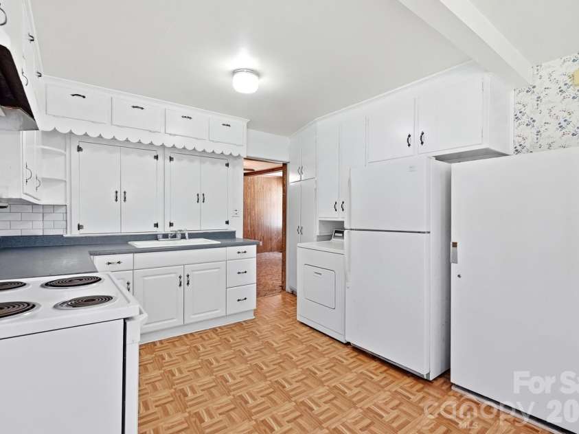 2517 Plum Street, Charlotte, NC 28269.  MLS# CAR4397203, YatesRealty ID 17348. Refrigerator plus Standing Freezer
