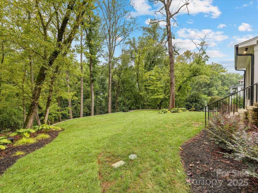 438 Wonderwood Drive, Charlotte, NC 28211.  MLS# CAR4290374, YatesRealty ID 17355. Fully fenced-in Backyard