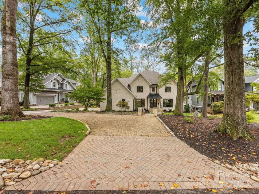 438 Wonderwood Drive, Charlotte, NC 28211.  MLS# CAR4290374, YatesRealty ID 17355. Street view of Circular Driveway and second driveway to Garage