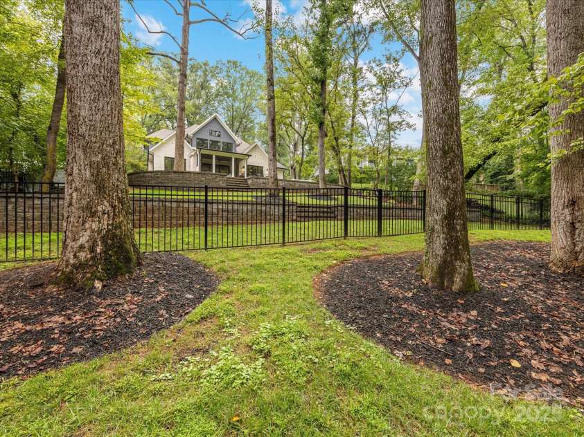 438 Wonderwood Drive, Charlotte, NC 28211.  MLS# CAR4290374, YatesRealty ID 17355. View of home from 2nd Terrace and back of the property
