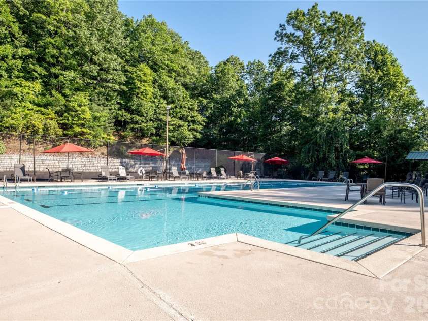 960 Middle Connestee Trail, Brevard, NC 28712.  MLS# CAR4373421, YatesRealty ID 17355. Connestee Falls community Pool