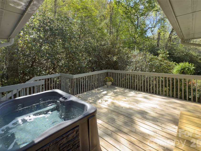 960 Middle Connestee Trail, Brevard, NC 28712.  MLS# CAR4373421, YatesRealty ID 17355. Hot tub conveys