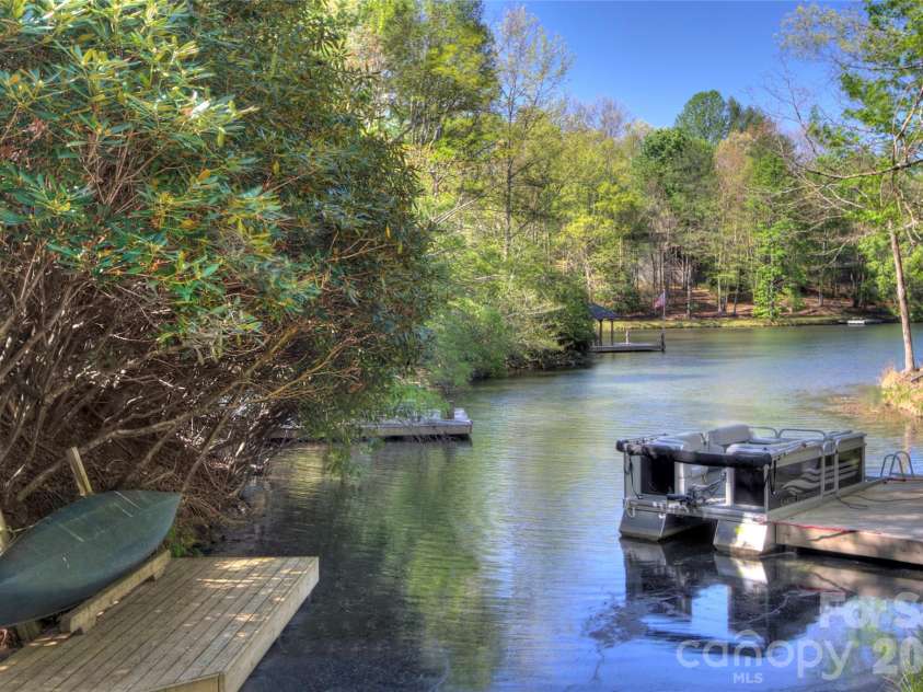 960 Middle Connestee Trail, Brevard, NC 28712.  MLS# CAR4373421, YatesRealty ID 17355. Lakefront retreat