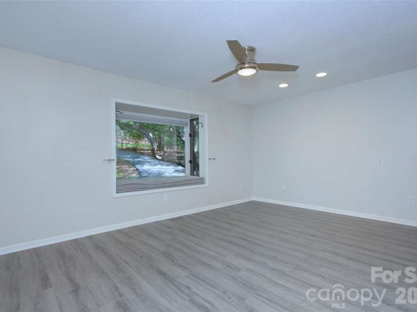 960 Middle Connestee Trail, Brevard, NC 28712.  MLS# CAR4373421, YatesRealty ID 17355. Primary Bedroom