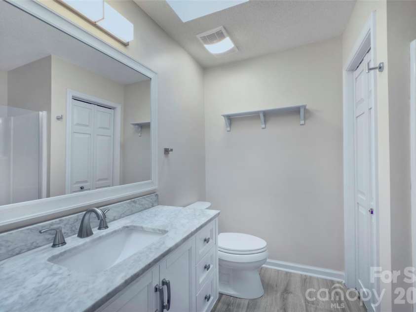 960 Middle Connestee Trail, Brevard, NC 28712.  MLS# CAR4373421, YatesRealty ID 17355. Primary Bedroom Ensuite
