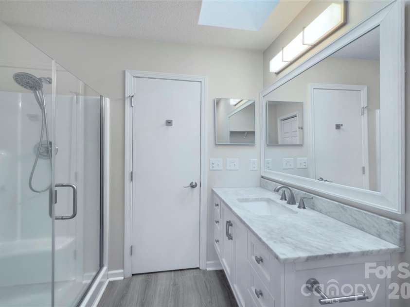 960 Middle Connestee Trail, Brevard, NC 28712.  MLS# CAR4373421, YatesRealty ID 17355. Primary Bedroom Ensuite