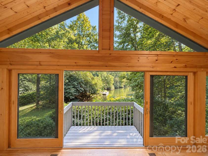 960 Middle Connestee Trail, Brevard, NC 28712.  MLS# CAR4373421, YatesRealty ID 17355. View off Balcony in Great Room