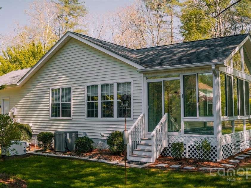 9 Manakiki Court, Etowah, NC 28729.  MLS# CAR4245266, YatesRealty ID 17356. Back View/ Four Seasons room