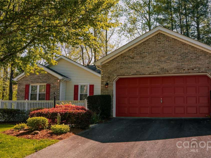 9 Manakiki Court, Etowah, NC 28729.  MLS# CAR4245266, YatesRealty ID 17356. Front view Garage