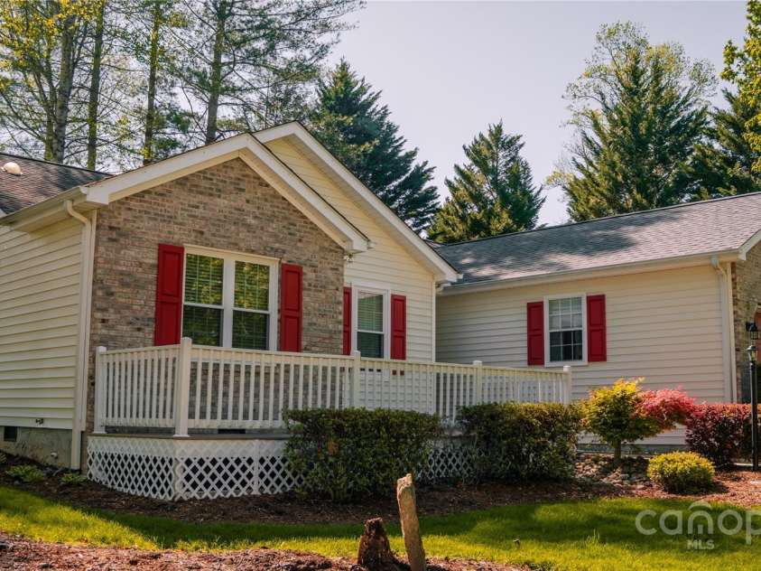 9 Manakiki Court, Etowah, NC 28729.  MLS# CAR4245266, YatesRealty ID 17356. Front view with deck
