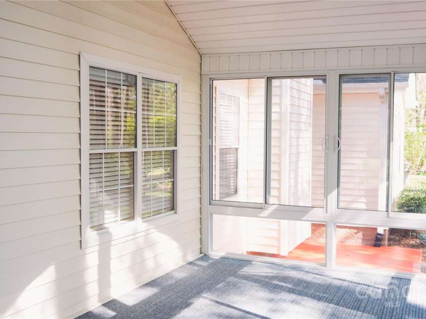 9 Manakiki Court, Etowah, NC 28729.  MLS# CAR4245266, YatesRealty ID 17356. Glasses Four Seasons Room