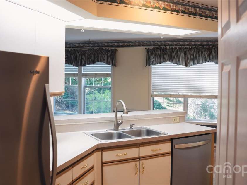9 Manakiki Court, Etowah, NC 28729.  MLS# CAR4245266, YatesRealty ID 17356. Kitchen entrance