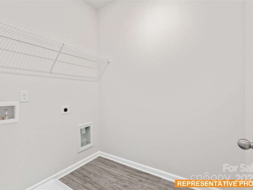 6024 Jasmine Branch Road, Charlotte, NC 28216.  MLS# CAR4260393, YatesRealty ID 17362. Suwanee Laundry Room