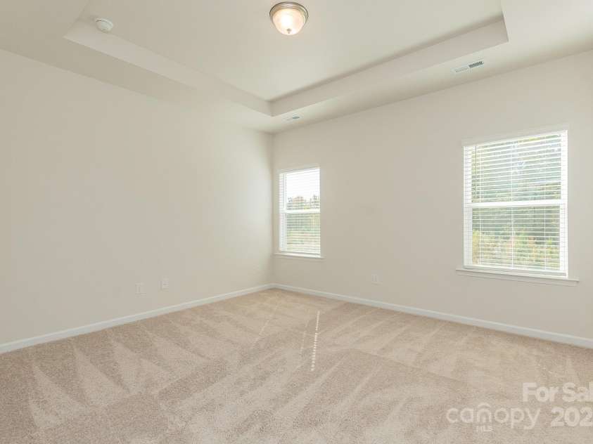 6024 Jasmine Branch Road, Charlotte, NC 28216.  MLS# CAR4260393, YatesRealty ID 17362. Suwanee Primary Bedroom