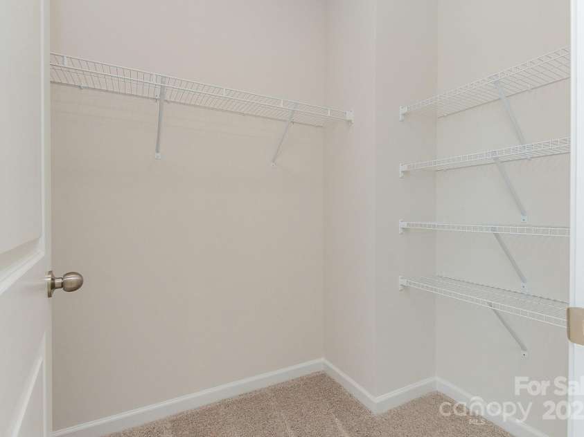 6024 Jasmine Branch Road, Charlotte, NC 28216.  MLS# CAR4260393, YatesRealty ID 17362. Suwanee Primary Closet