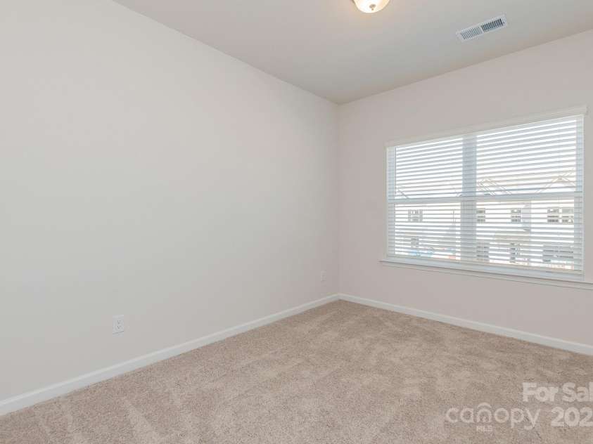 6024 Jasmine Branch Road, Charlotte, NC 28216.  MLS# CAR4260393, YatesRealty ID 17362. Suwanee Secondary Bedroom 2