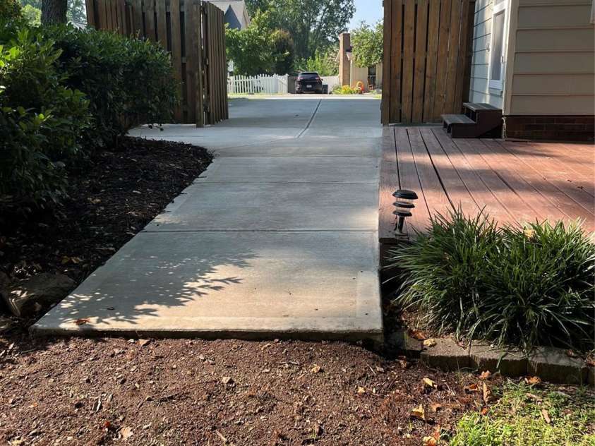 21614 Colina Drive, Cornelius, NC 28031.  MLS# CAR4255901, YatesRealty ID 17364. New concrete walkway