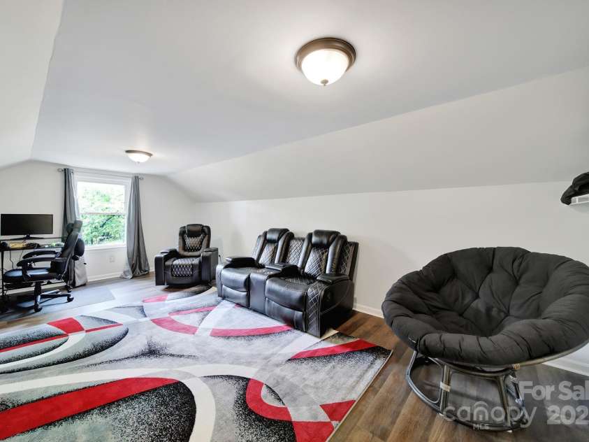 2248 White Heron Road, Liberty Hill, SC 29074.  MLS# CAR4263378, YatesRealty ID 17366. Media room-upper level