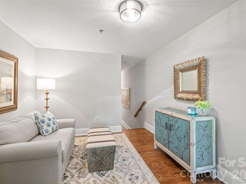 100 Laurel Avenue, Charlotte, NC 28207.  MLS# CAR4374036, YatesRealty ID 17367. Simplify your daily routine with direct access through the back entrance, featuring a private garage and a personal driveway...an exclusive perk offered to only five units in the entire community.