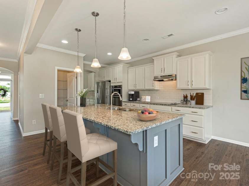 4912 Grace View Drive, Pineville, NC 28134.  MLS# CAR4261040, YatesRealty ID 17367. Kitchen Island virtually staged.