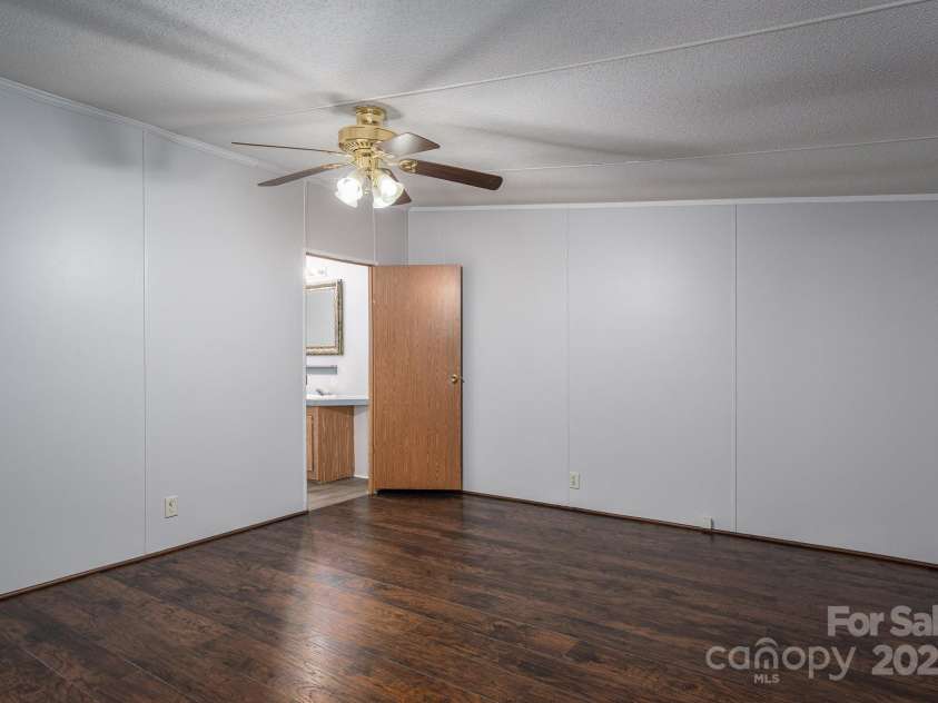 6903 Knottywood Lane, Vale, NC 28168.  MLS# CAR4264678, YatesRealty ID 17368. Primary bedroom