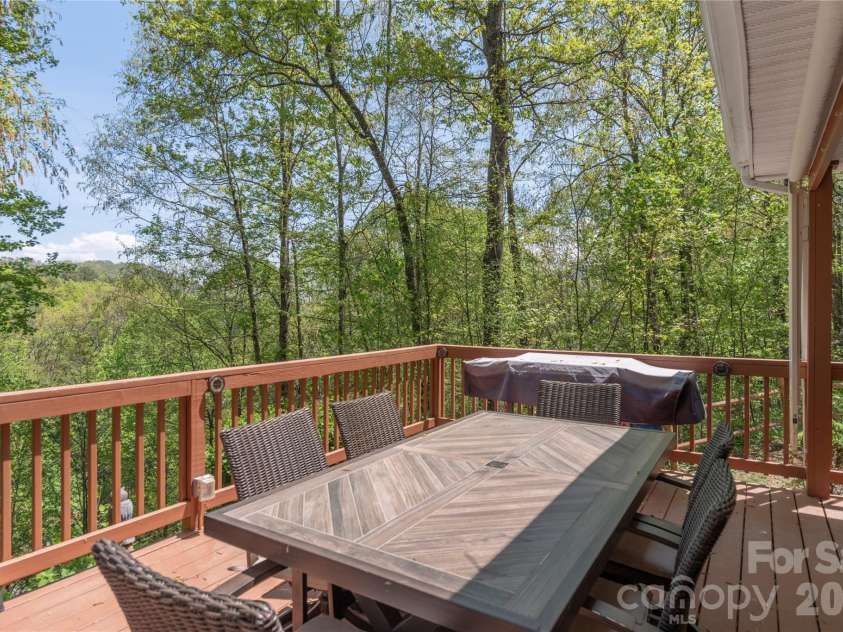 860 Creekside Drive, Maggie Valley, NC 28751.  MLS# CAR4329432, YatesRealty ID 17376. Where dinner comes with fresh mountain air