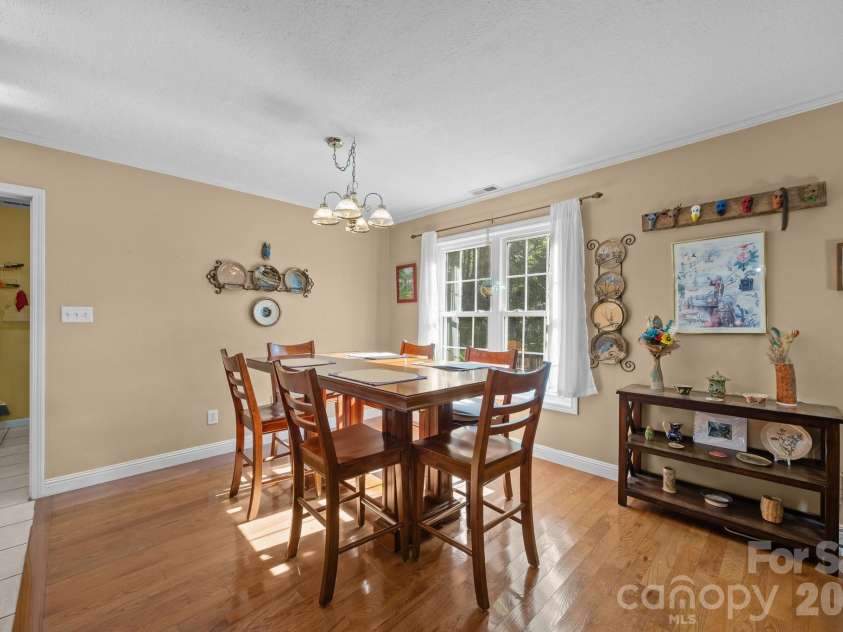 73 Waters Road, Asheville, NC 28805.  MLS# CAR4364687, YatesRealty ID 17378. Dining area just off the kitchen 