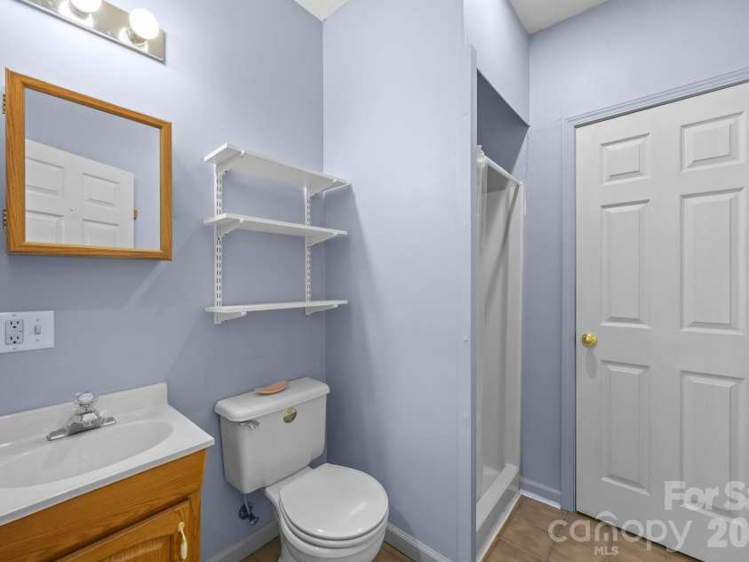 73 Waters Road, Asheville, NC 28805.  MLS# CAR4364687, YatesRealty ID 17378. Full bathroom in the basement