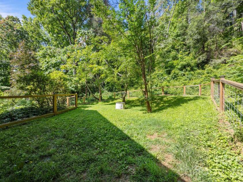 73 Waters Road, Asheville, NC 28805.  MLS# CAR4364687, YatesRealty ID 17378. Fully fenced yard