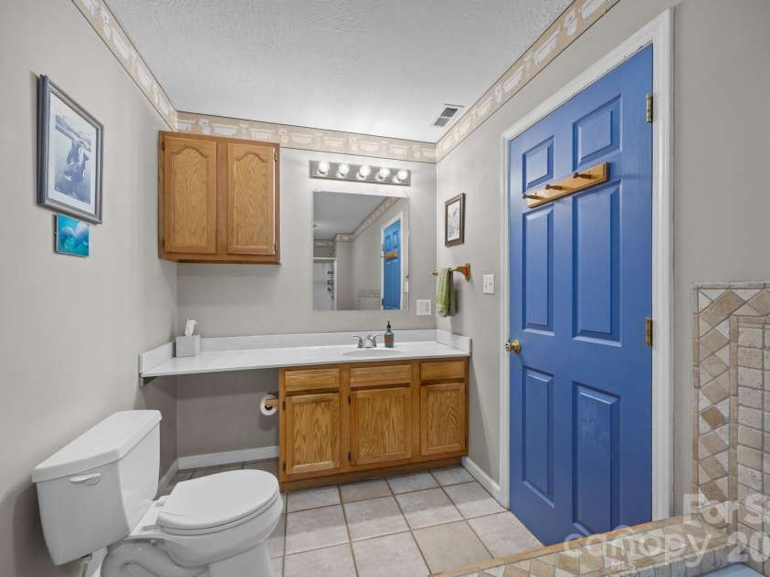 73 Waters Road, Asheville, NC 28805.  MLS# CAR4364687, YatesRealty ID 17378. Primary bathroom
