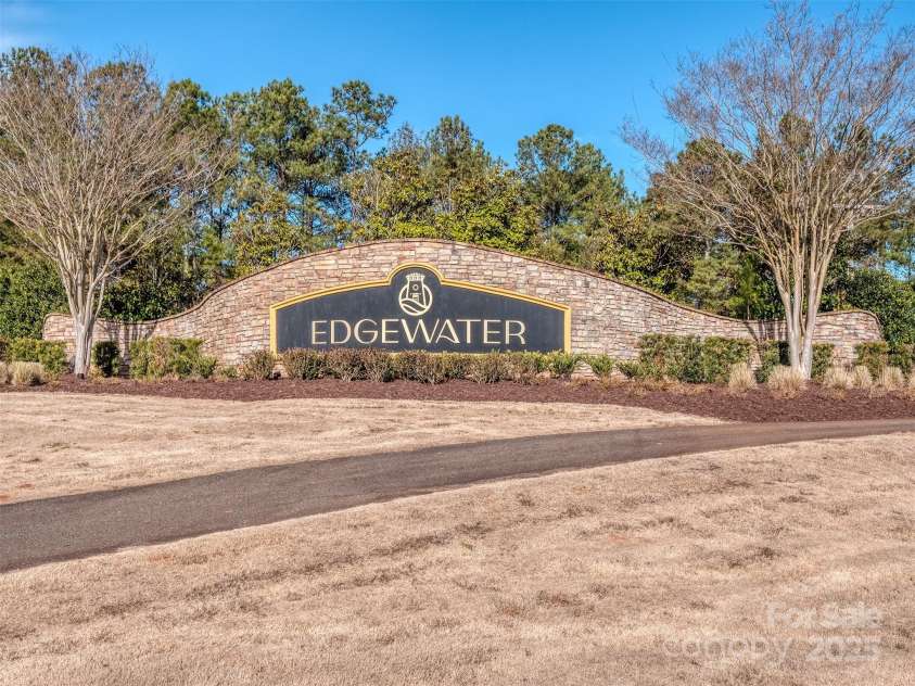 5220 Admirals Landing, Lancaster, SC 29720.  MLS# CAR4217741, YatesRealty ID 1738. Edgewater is a destination community with golf, pools, clubhouses, tennis, bocce courts, walking trails, boating, & tons of activities for residents!