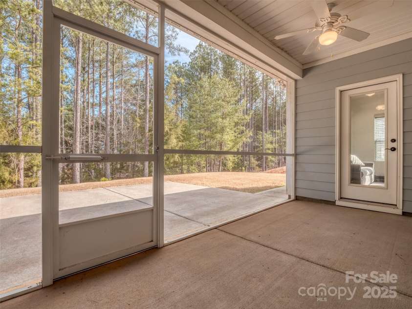 5220 Admirals Landing, Lancaster, SC 29720.  MLS# CAR4217741, YatesRealty ID 1738. Lovely screened porch overlooking a private, wooded rear yard!