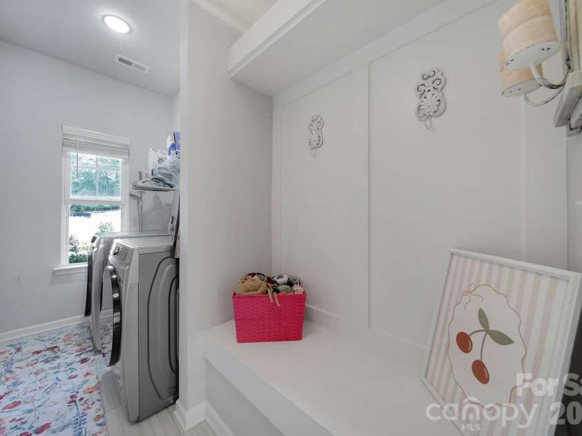 12120 Plover Drive, Charlotte, NC 28269.  MLS# CAR4366477, YatesRealty ID 17383. Laundry and mud room 