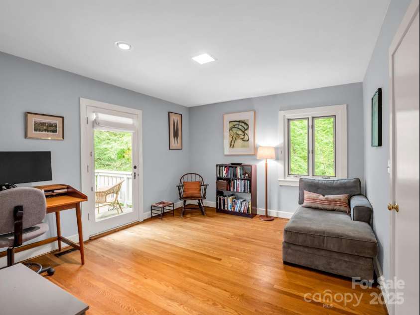 185 Greenstoke Loop, Tryon, NC 28782.  MLS# CAR4261125, YatesRealty ID 17387. Guest Bedroom #2 with access to a small deck