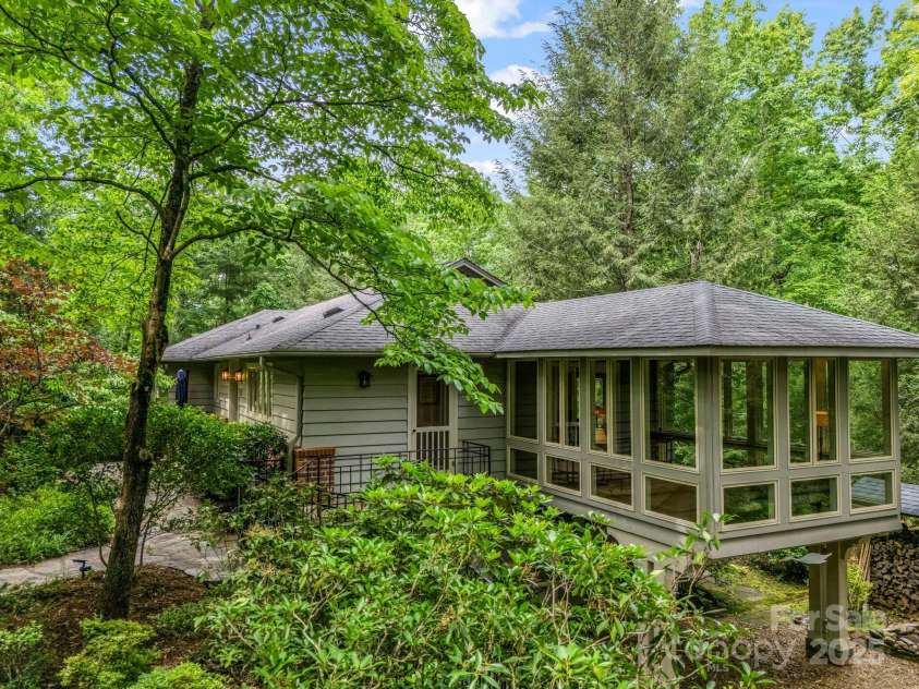 185 Greenstoke Loop, Tryon, NC 28782.  MLS# CAR4261125, YatesRealty ID 17387. Nicely landscaped with native shrubs