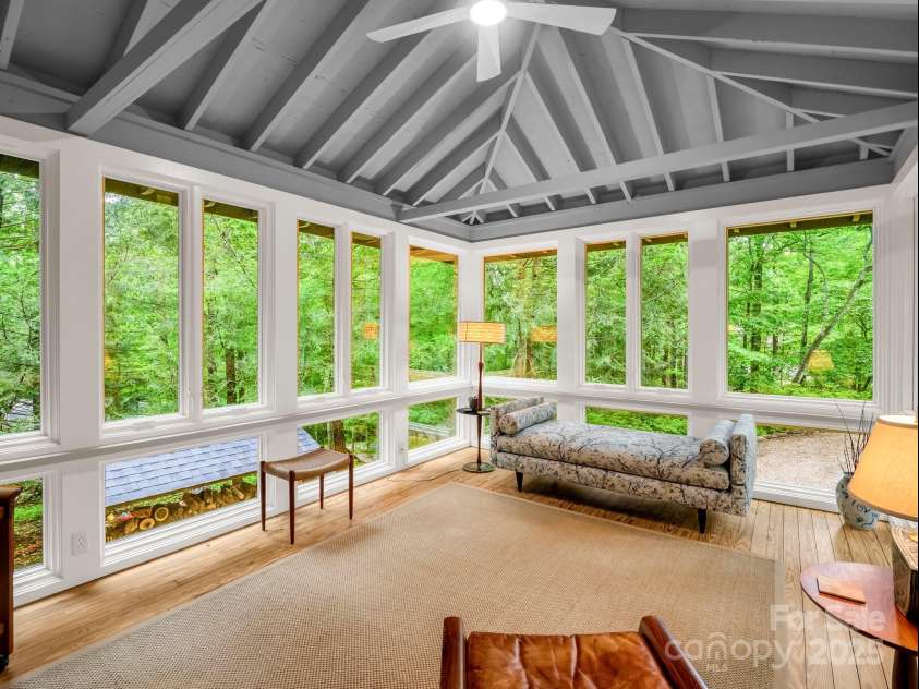 185 Greenstoke Loop, Tryon, NC 28782.  MLS# CAR4261125, YatesRealty ID 17387. Versatile Sunroom for relaxing or entertaining